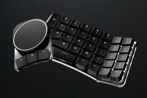 带有鼠标垫、操纵杆和3D导航仪的可定制的溢出键盘使您的办公桌变得超出预期