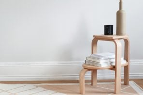 这个最小的木制台阶凳被设计成可以作为边桌和植物架